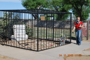 Woman standing next to Billy the Kid's grave - love historical fiction