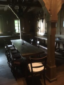 old hall with table and chairs