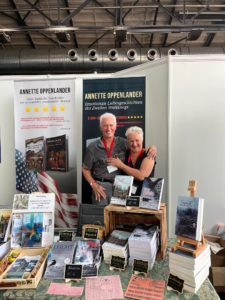 couple standing at a book table